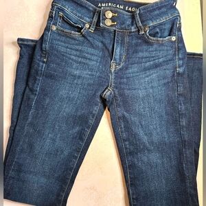 American Eagle kick boot next level stretch size 0 /short dark blue jeans.